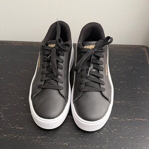 Puma Women’s Black and White Sneakers